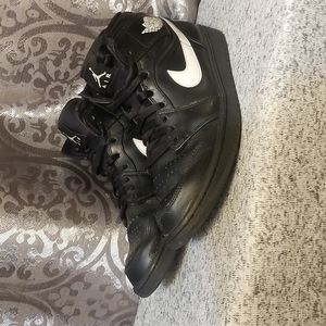 Black Air Jordans  with a nike Sign size 10 Pre Owened